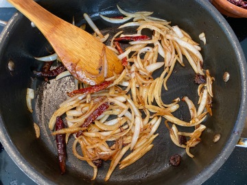 Sautee onion with chiles.